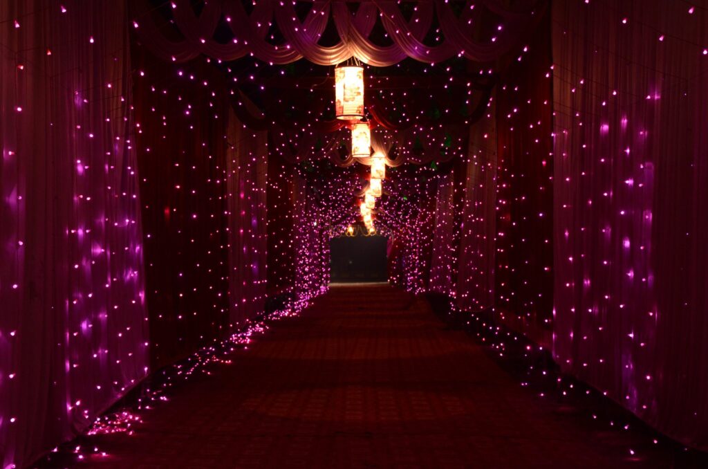 Purple String Lights and Lamps With Curtains